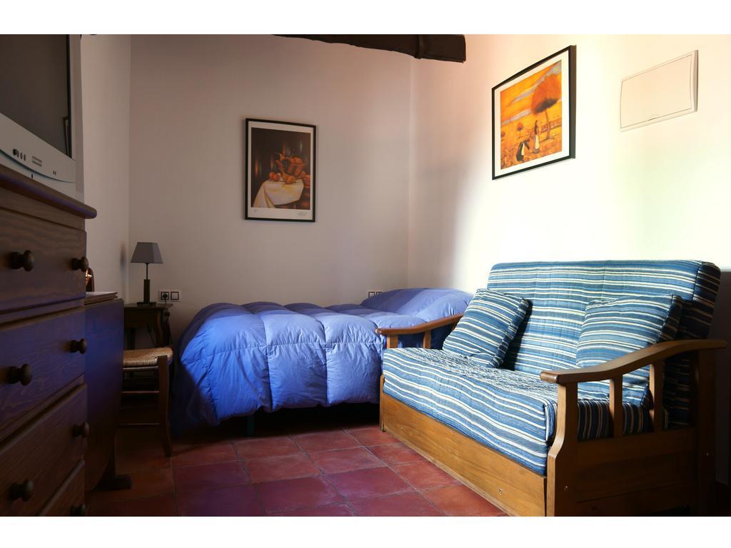 Apartamentos Rurales Victor Chamorro Del Arco Hervas Room photo